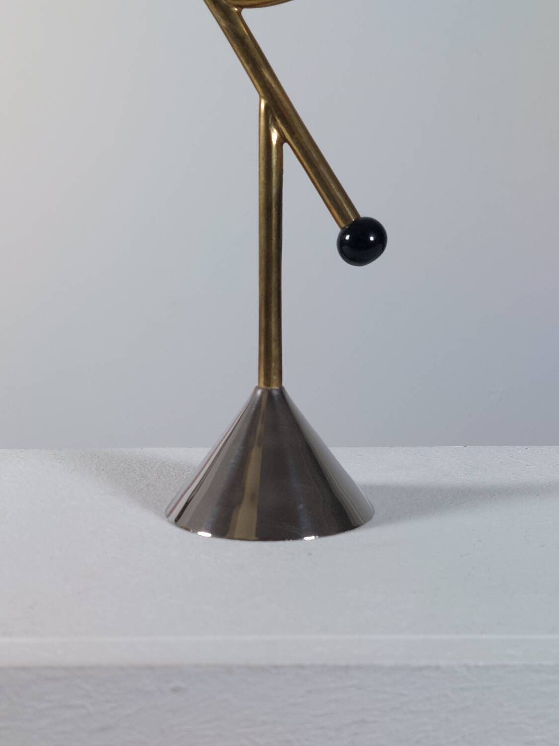 Vintage postmodern sculptural candlestick in chrome brass from the 1980s.