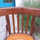 4 bentwood bistro chairs with a pattern on the seat