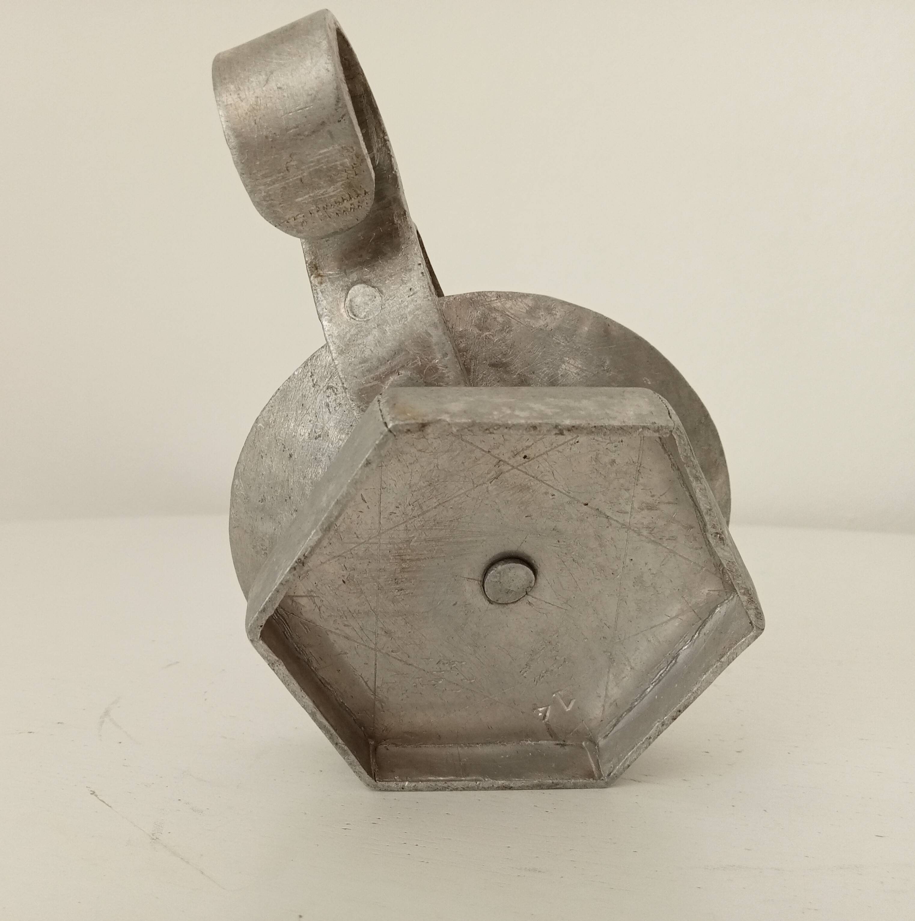 Vintage zinc hand candle holder