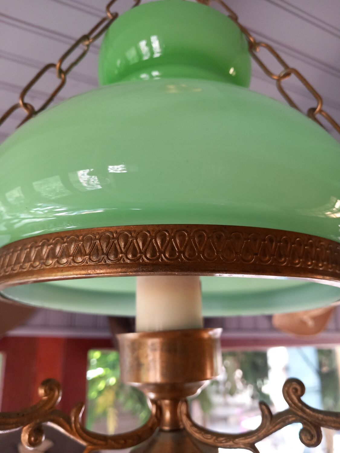 Old green opaline chandelier, gold metal and earthenware