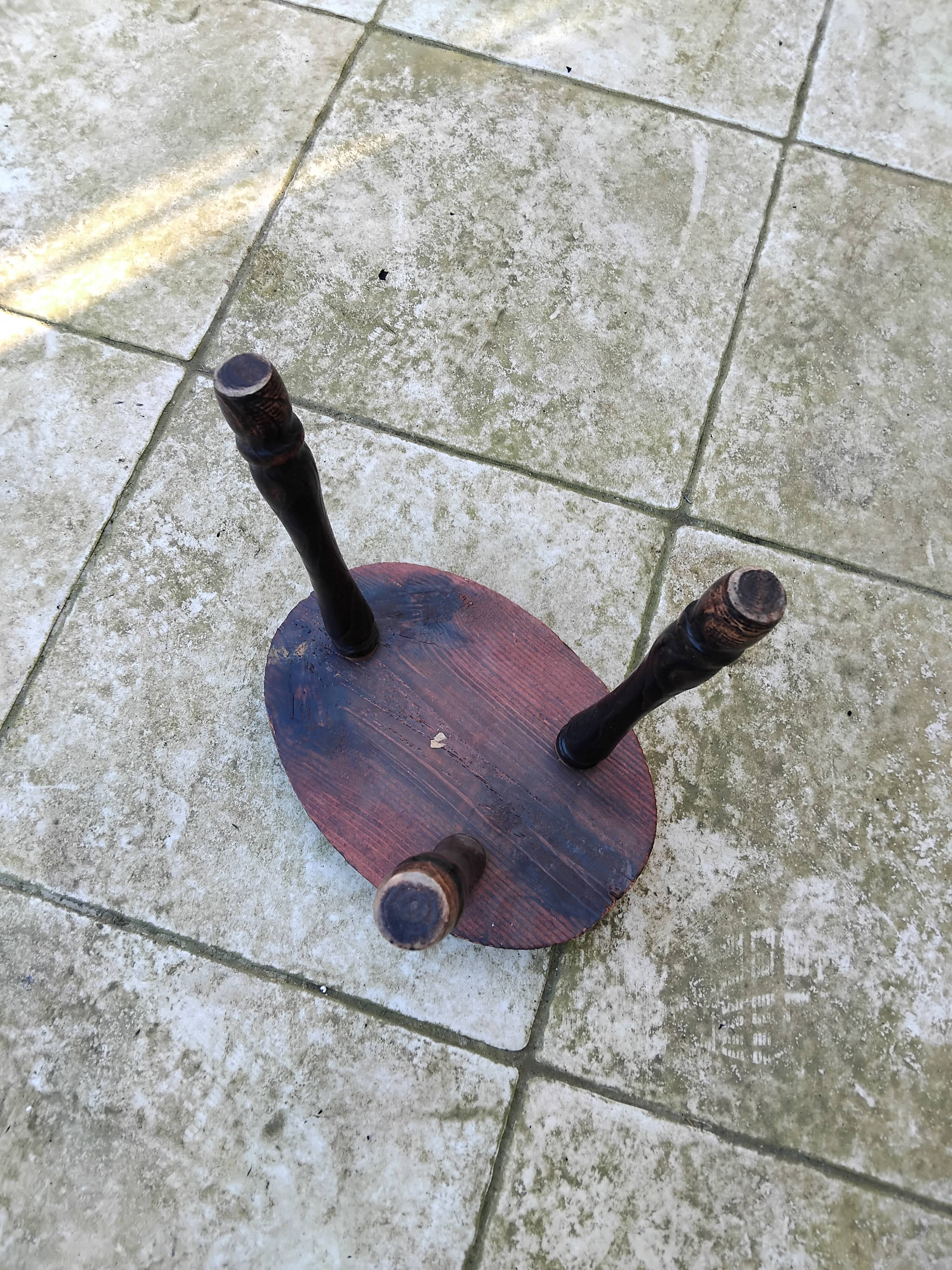 Old vintage oval tripod stool