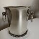 Silver-plated metal flowerpot in the style of Jean Després, 1950