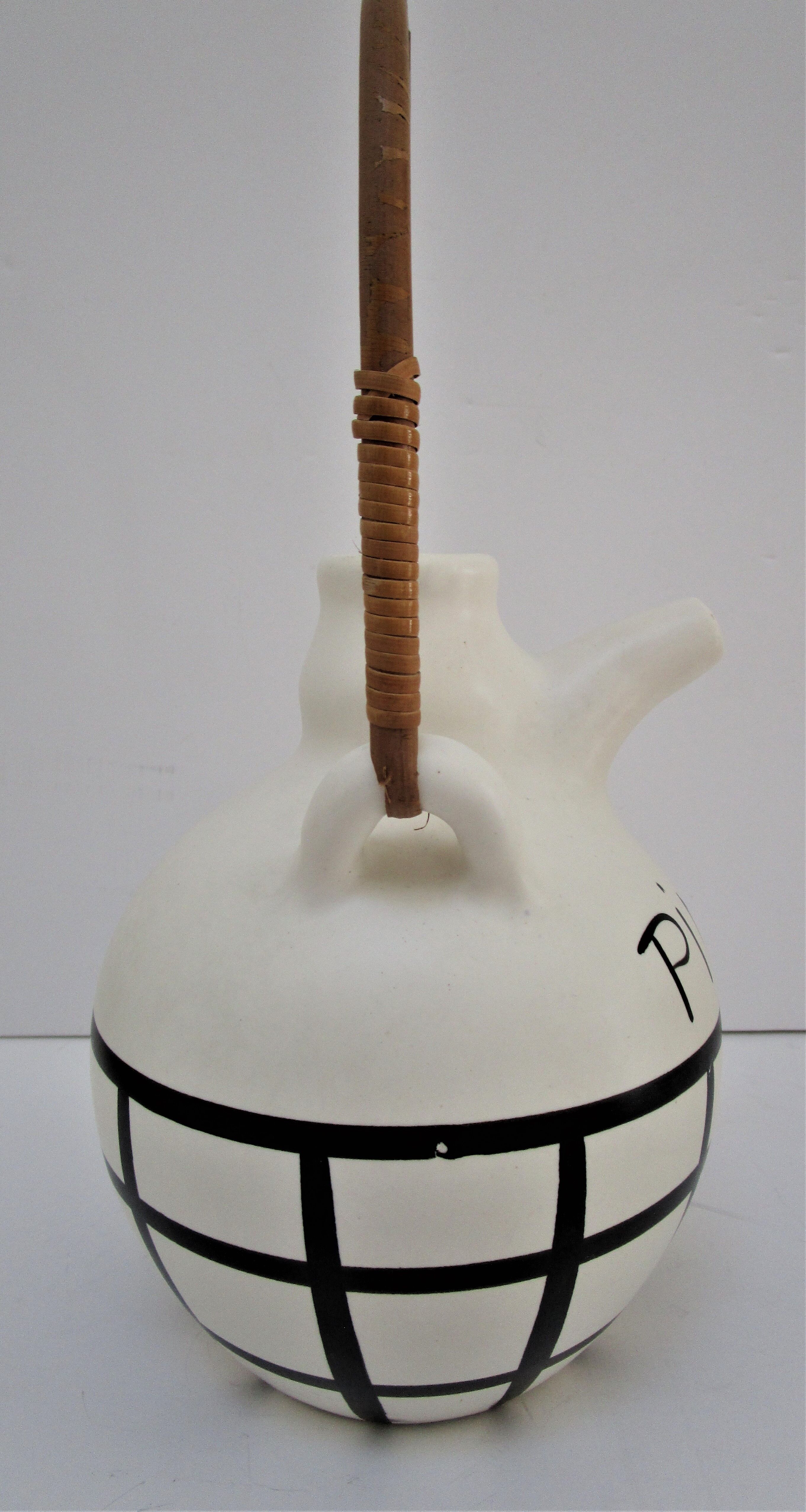 pineau bottle and ceramic cup by Lili Voltz 60s