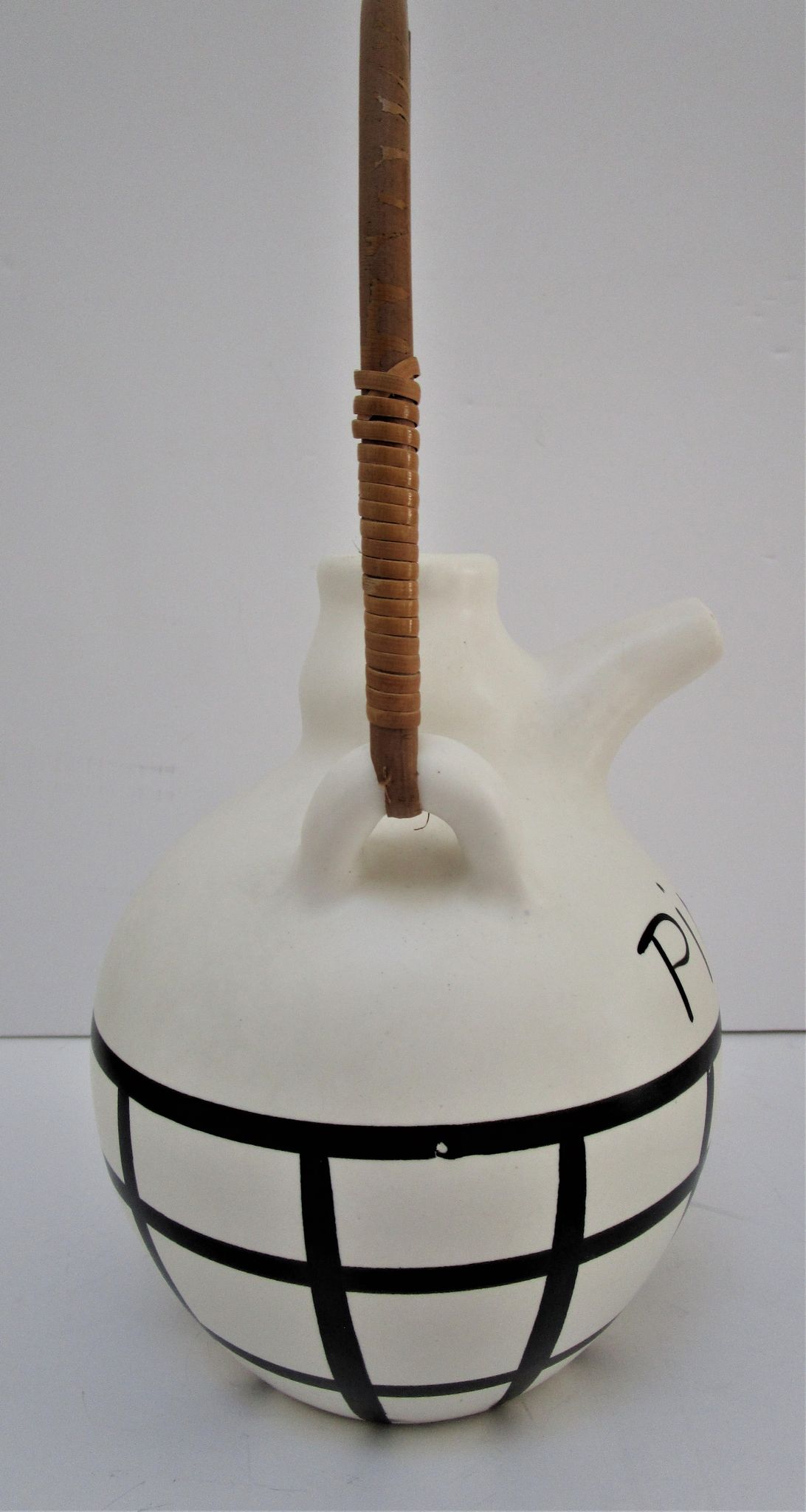 pineau bottle and ceramic cup by Lili Voltz 60s