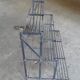 Iron plant holder