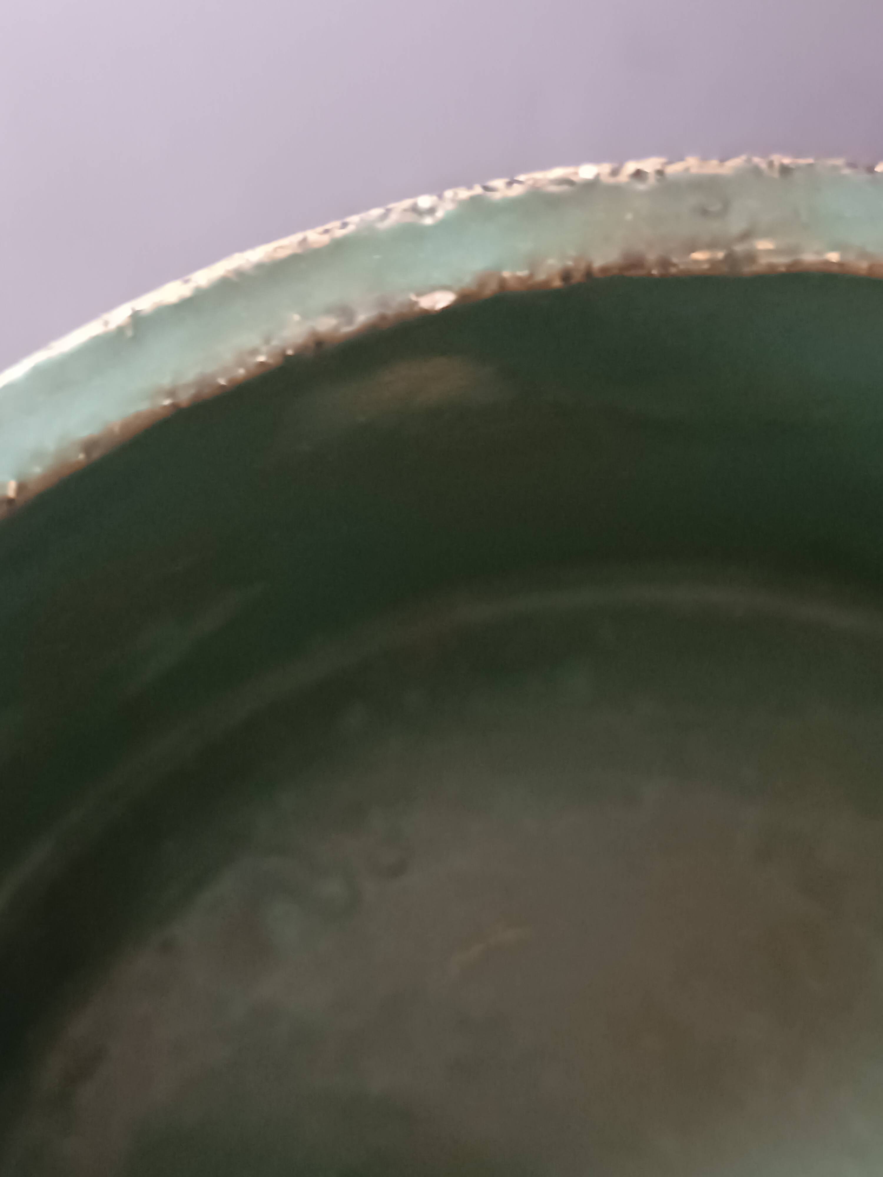 Footed dish in chamotte stoneware green with signature 1960