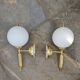 Pair of Art Deco style wall lights in brass and milk glass Sölken Leuch