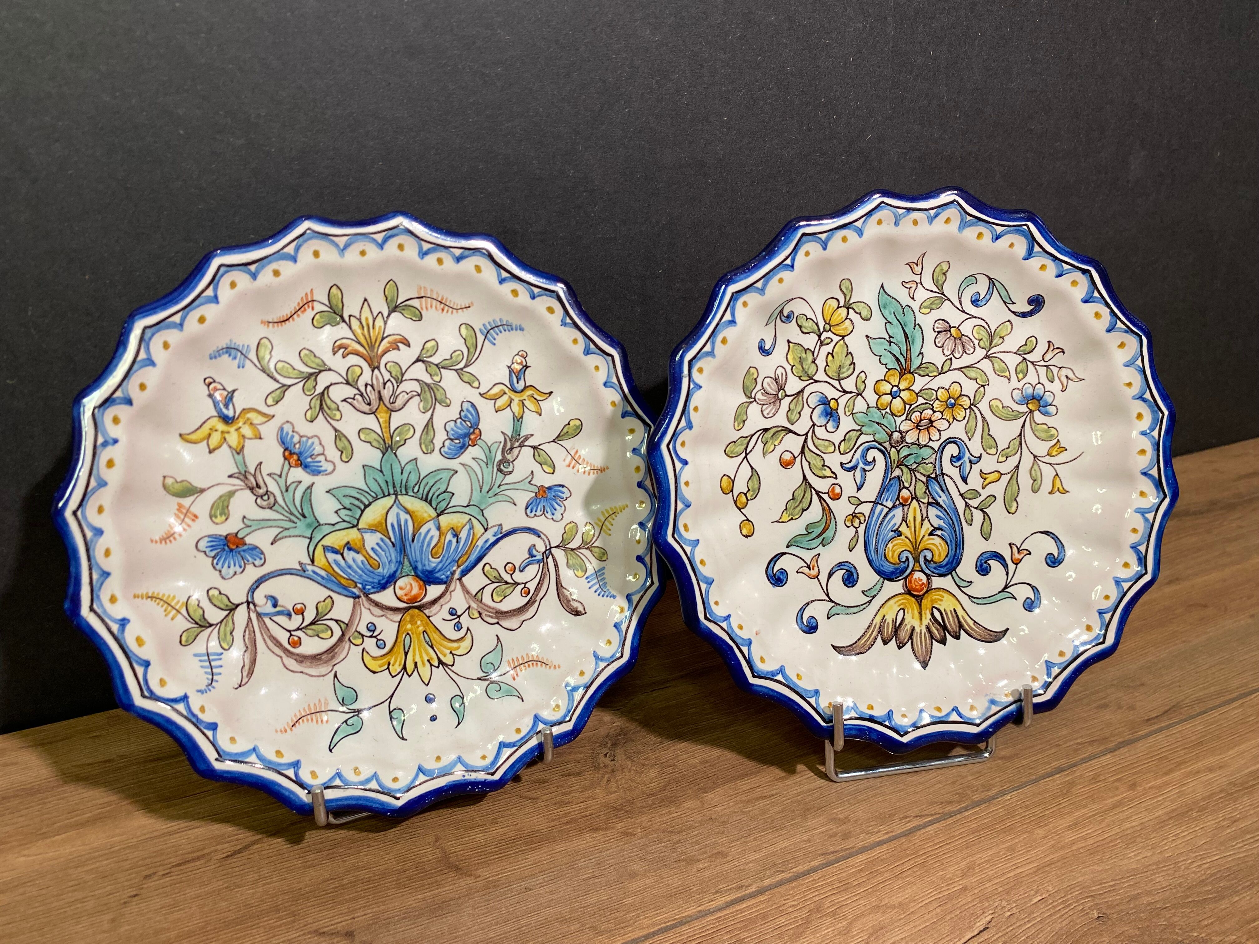 Pair of plates with floral decoration in Nevers earthenware signed Montagnon