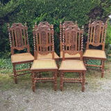 Carved antique chairs with rattan seat