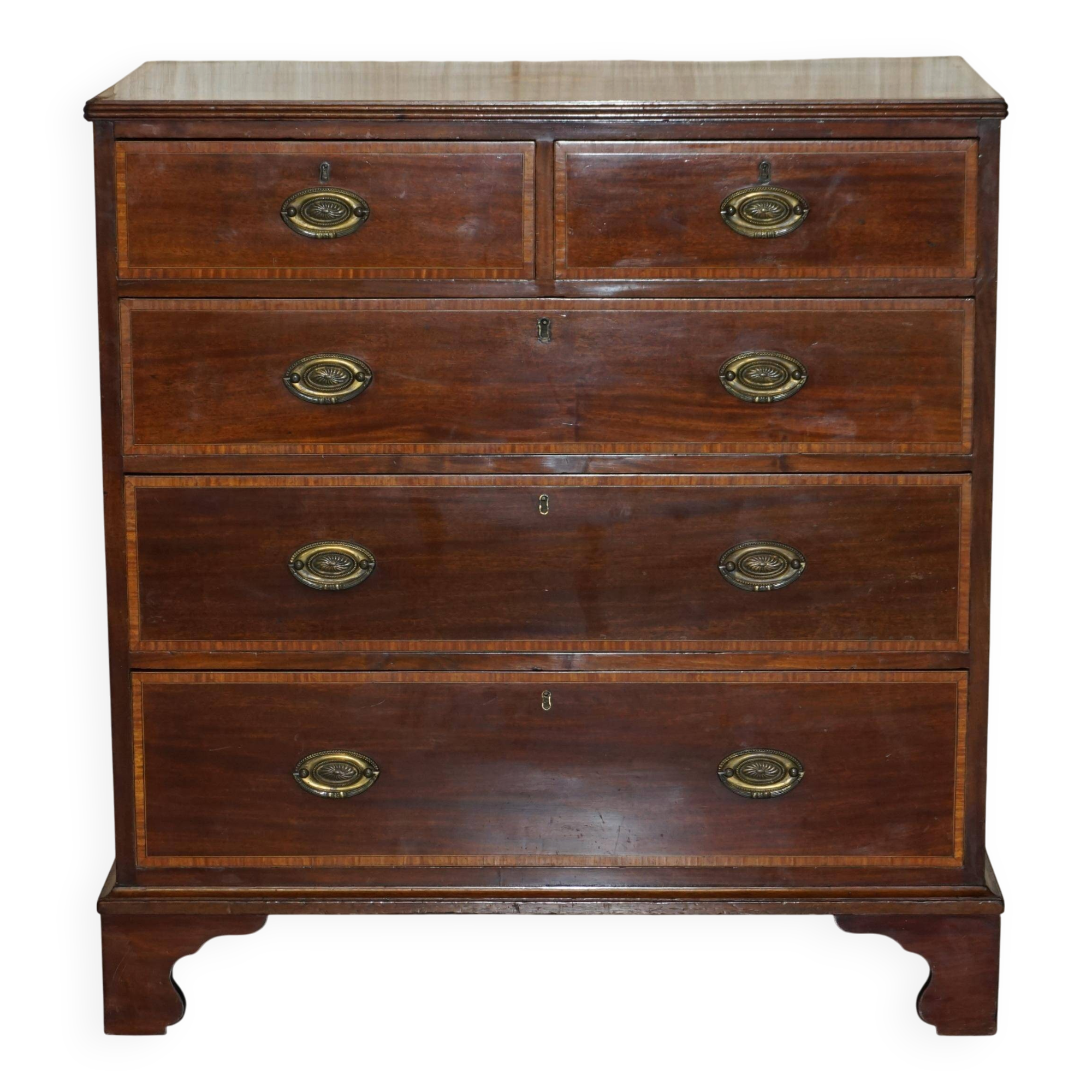Antique Sheraton style commode by F. Thomas in hardwood and satinwood.