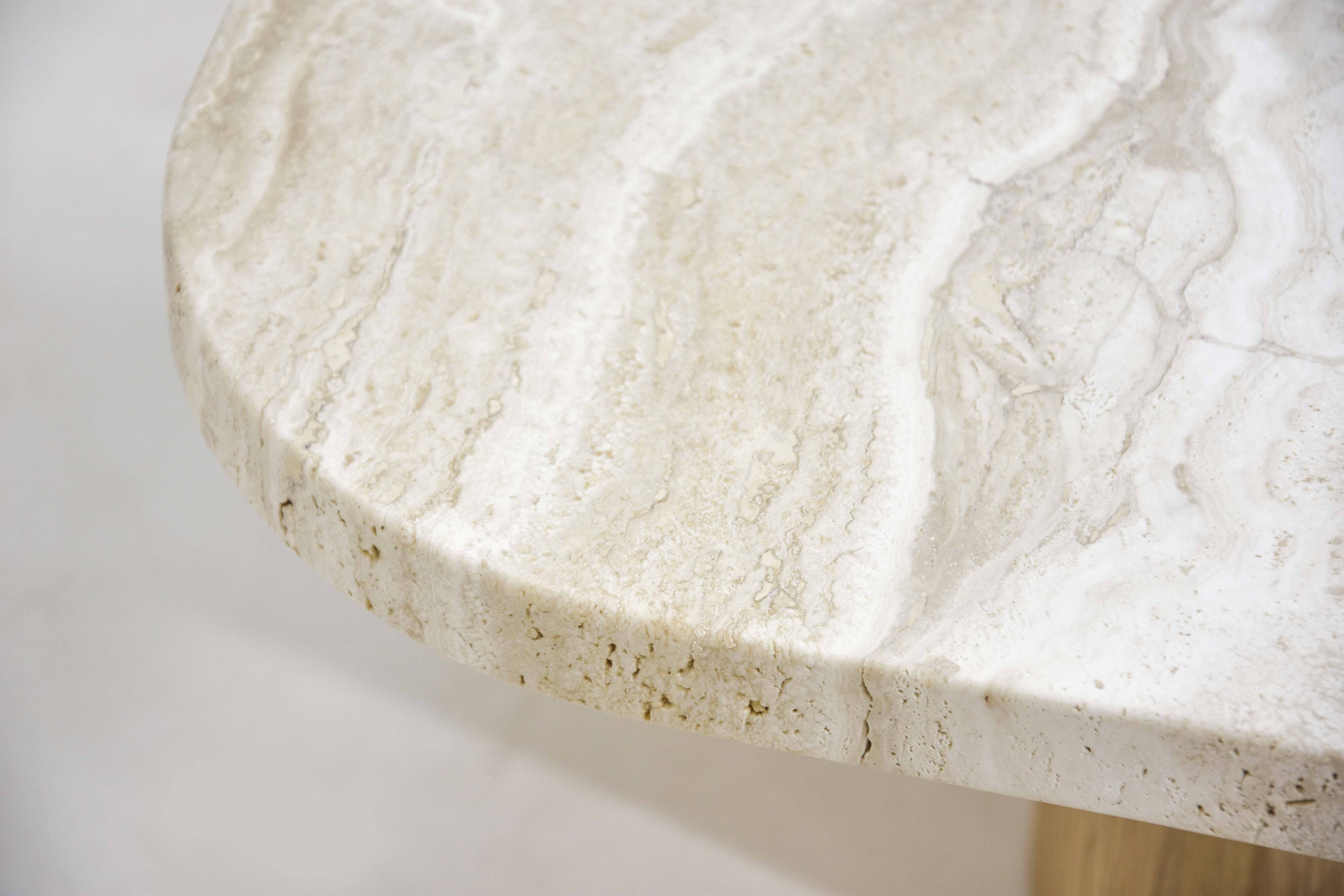 Coffee table in travertine and oak.