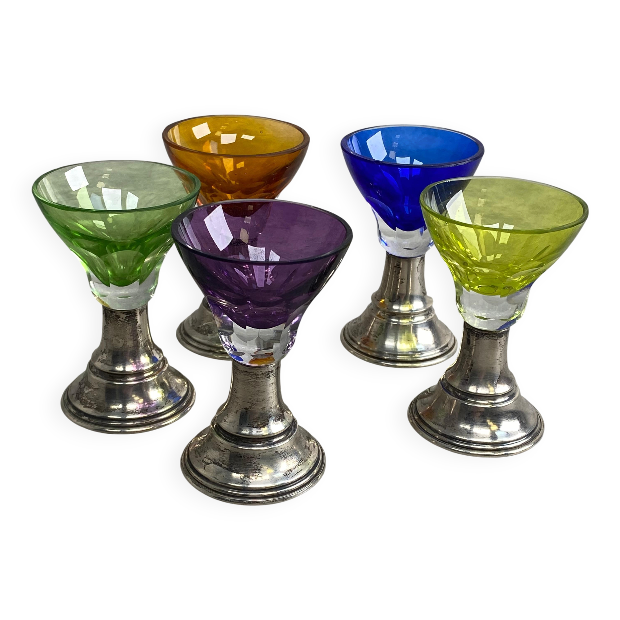 Set of 5 coloured stemmed glasses on silver stems.