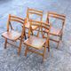 A set of 4 vintage folding wooden chairs, 1970s.
