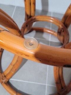 Rattan table and smoked glass