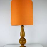 Turned wood lamp with orange shade, 1970s.