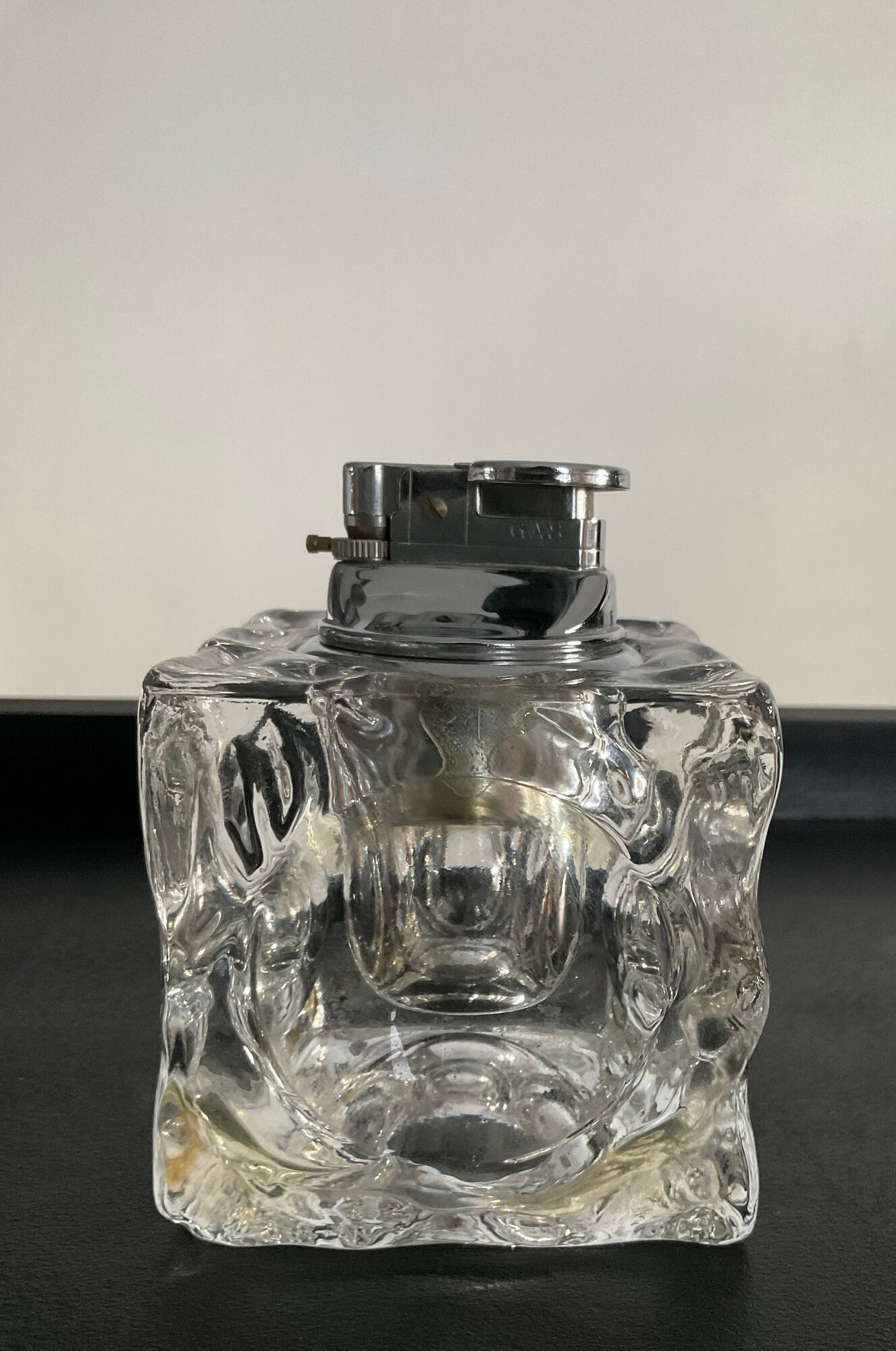 Vintage lighter from the 70s in molded glass