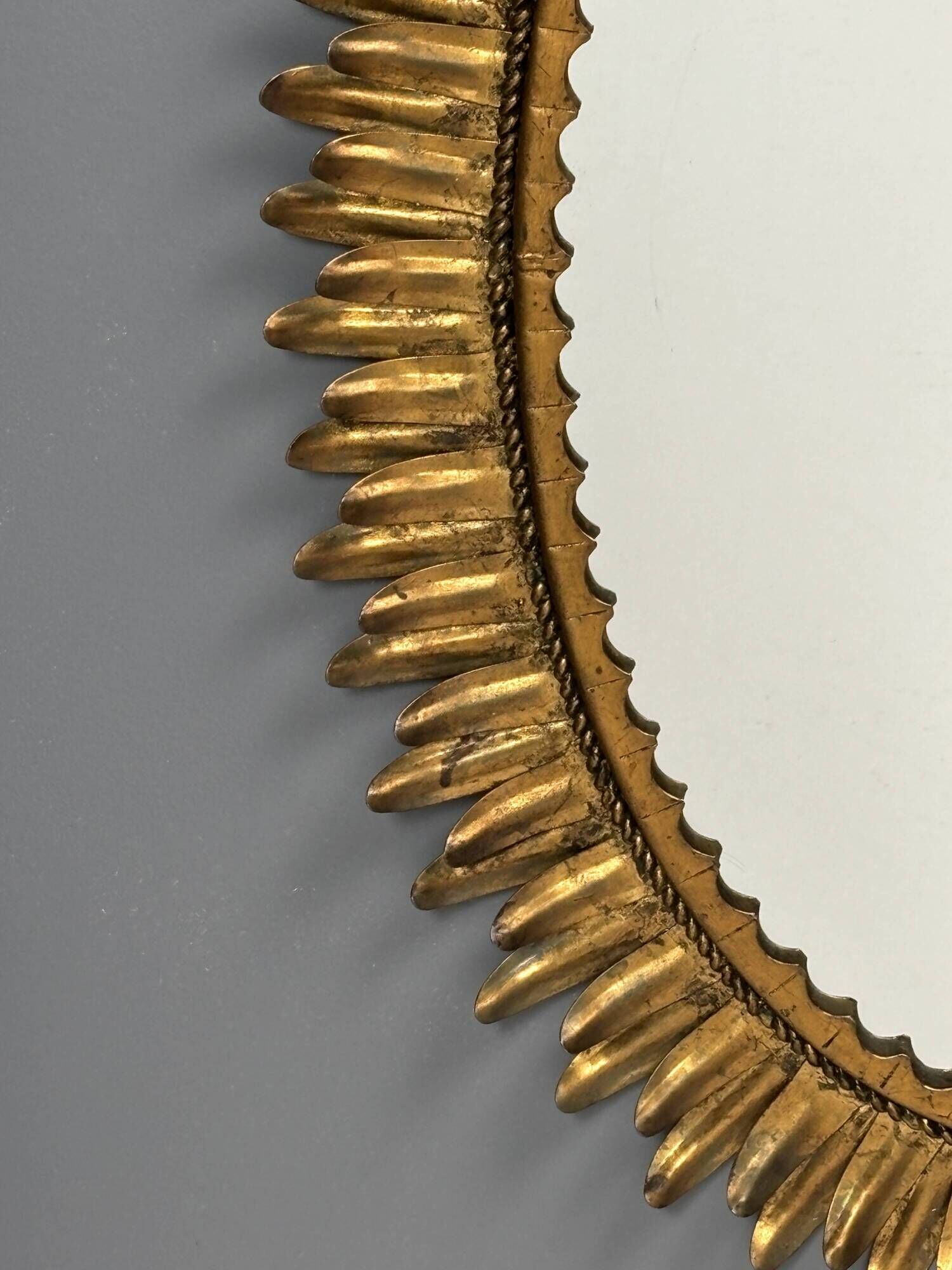 Midcentury bohemian Hollywood Regency Spanish gilt metal sun mirror, 1960s