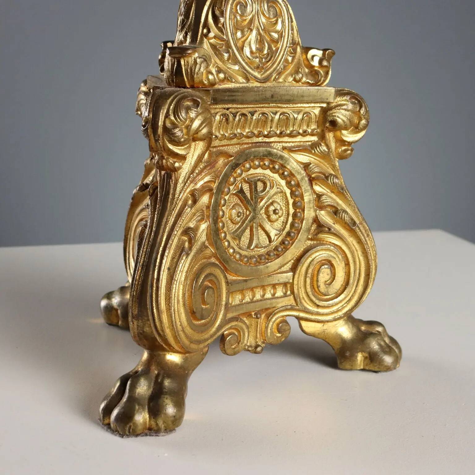 Antique gilded bronze candelabrum, 19th-century decorations.