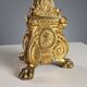 Antique gilded bronze candelabrum, 19th-century decorations.