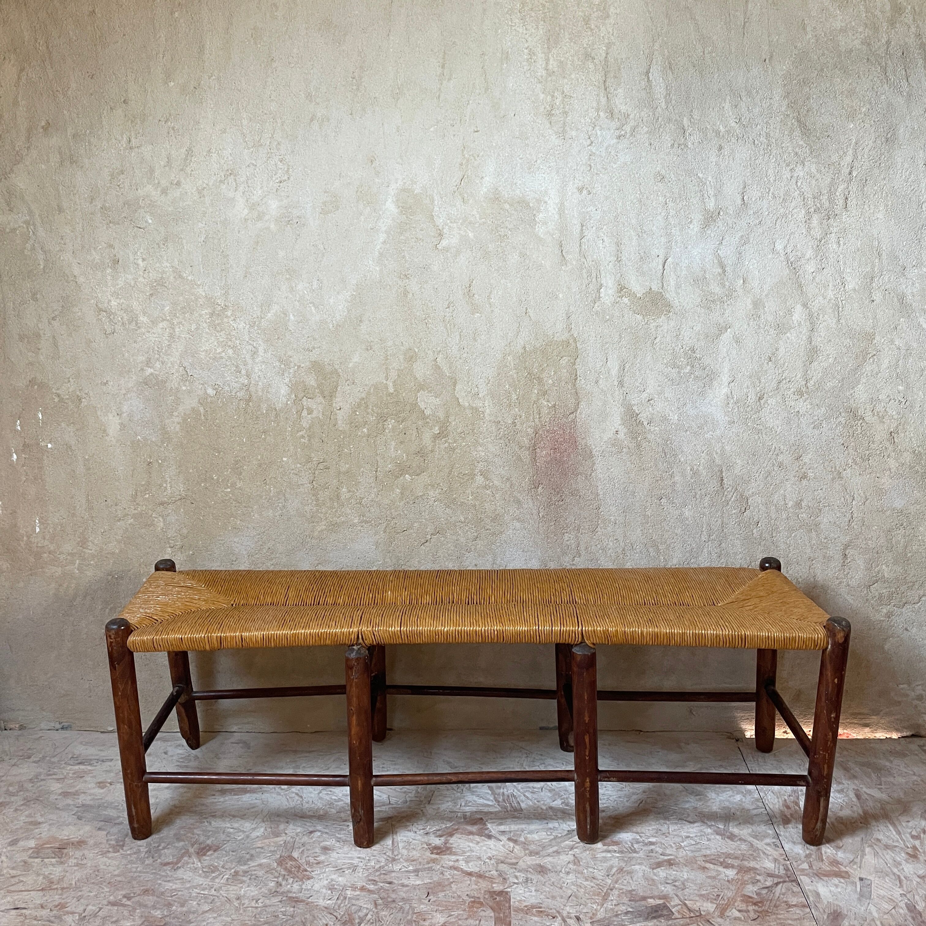 Rustic wood and straw bench