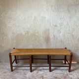 Rustic wood and straw bench