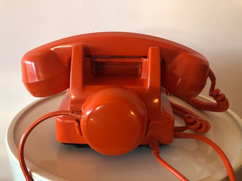 Orange Socotel phone with keys from the 70s 80s