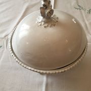 Covered cut of the House Astier de Villatte in black white enamelled earth