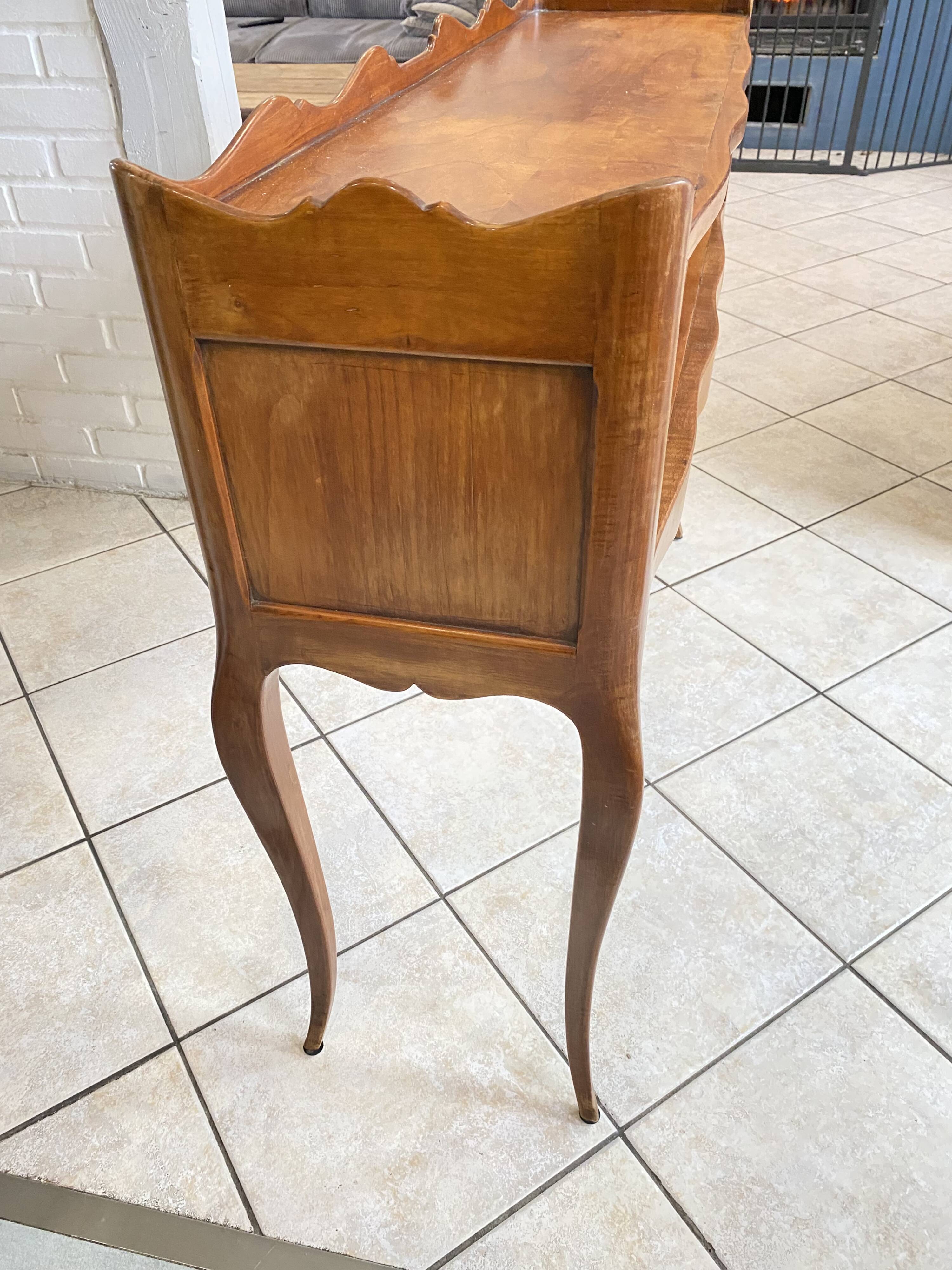Console with a niche in cherry wood in Louis XV style.