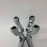 A chromed metal candle-holder "Chorus", design Karim Rashid, executed by Umbra / USA 2002