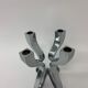 A chromed metal candle-holder "Chorus", design Karim Rashid, executed by Umbra / USA 2002