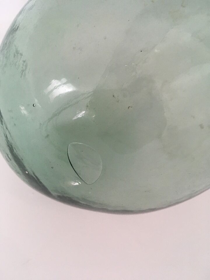 Demijohn in the shape of a drop.