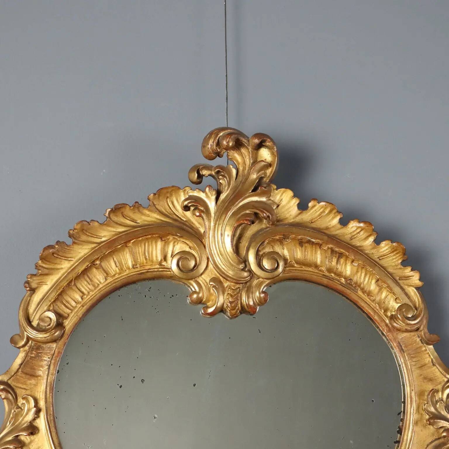 Antique baroque mirrors in carved wood, Italy, 19th century.