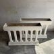 Pair of sculptural cast concrete planters in Off-White, mid-century brutalist style, long and rectangular.