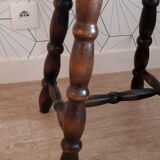 Brown turned wooden stool.