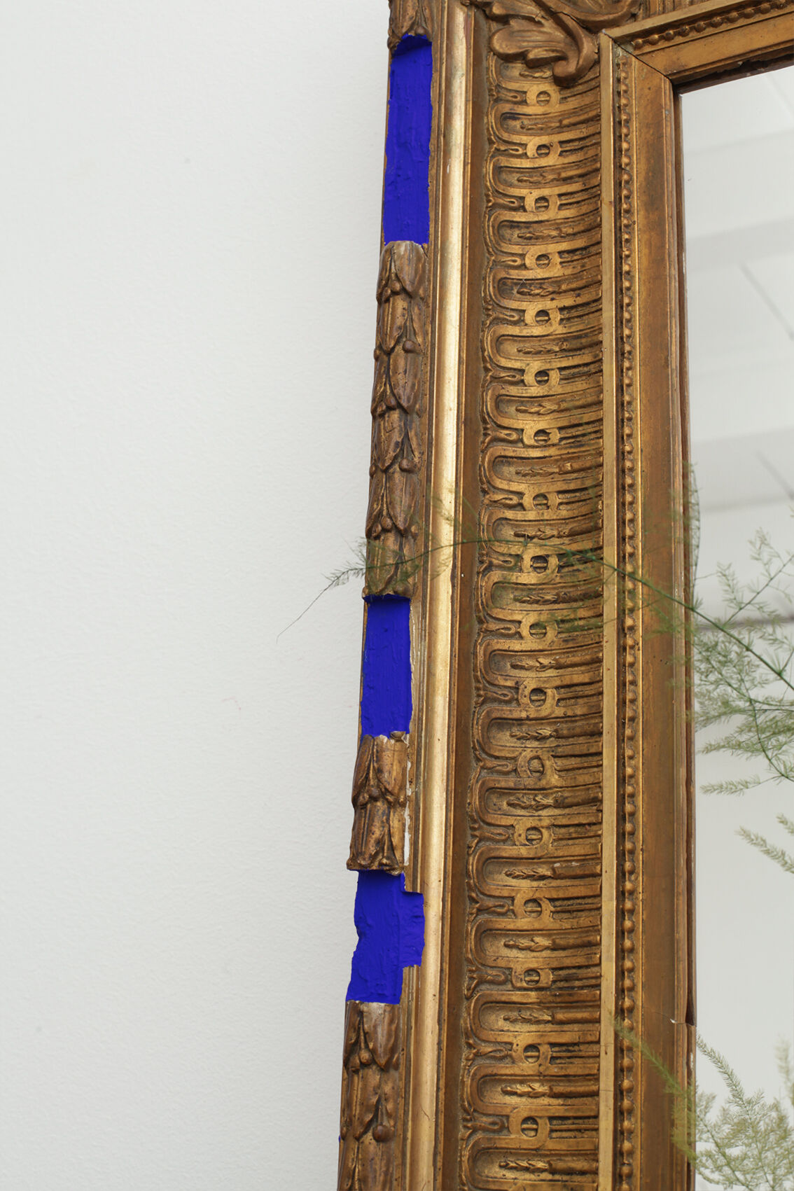 Golden antique mirror with leaf and bright king blue