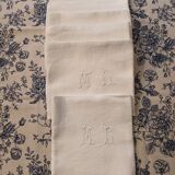 7 napkins with embroidered initials ML