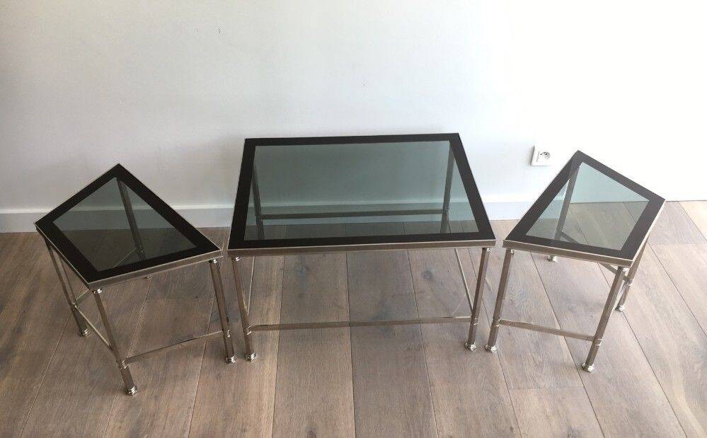 Rare three-part nickel coffee table with lacquered glass tops around the perimeter