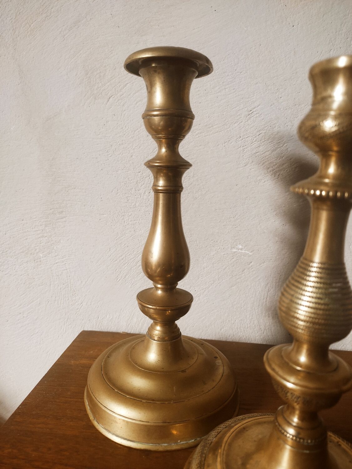 Duo of brass candle holders