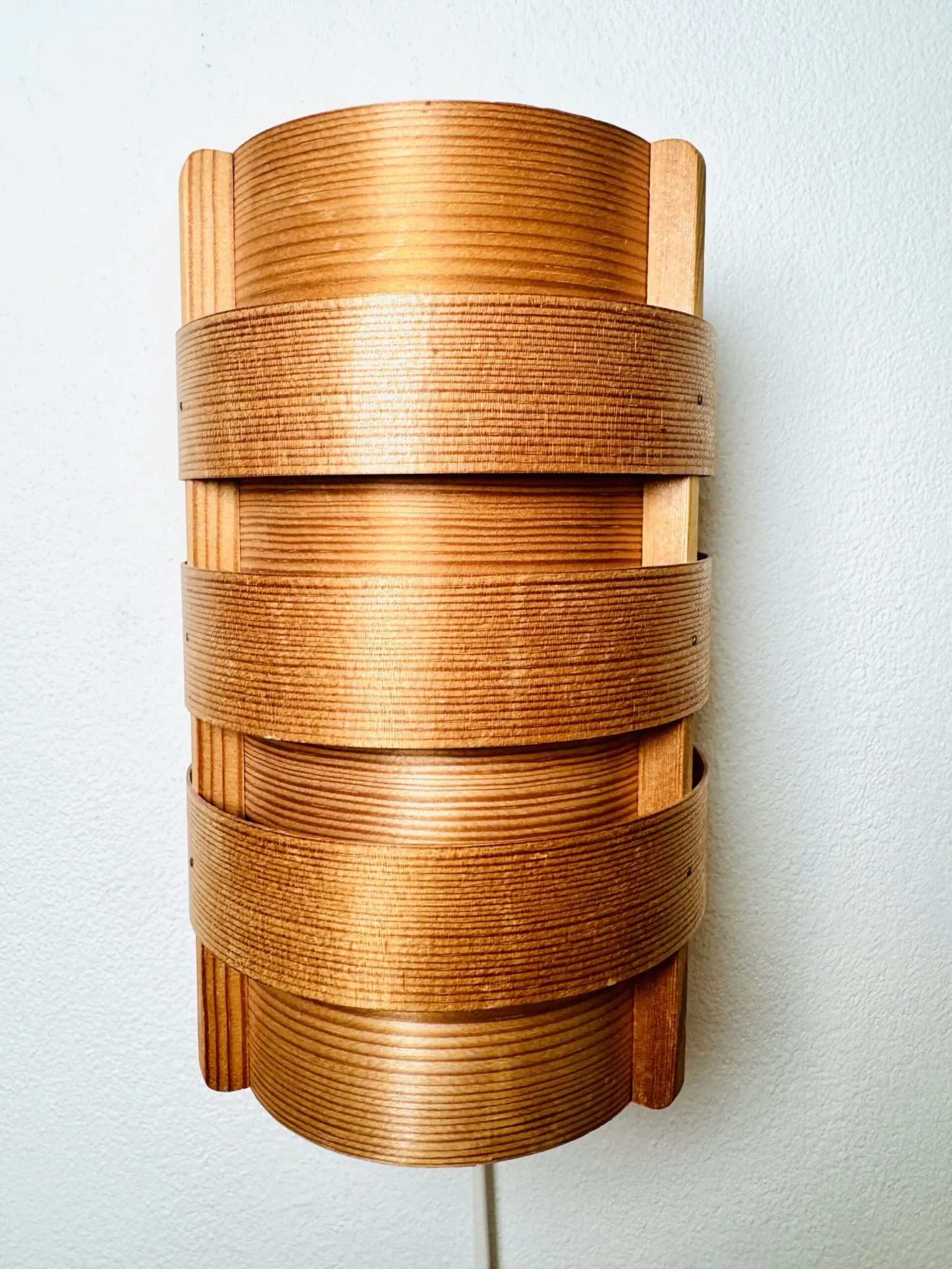 Wall sconces in pine veneer by Hans-Agne Jakobsson for Ab Ellysett, Sweden, 1960s.
