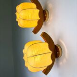 Pair of "Cocoon" wall lights, resin and pine, Italy, 1970s