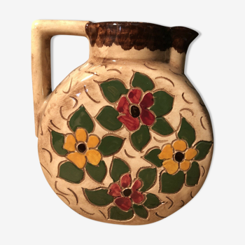 Ceramic pitcher with floral decoration signed Lucq