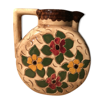 Ceramic pitcher with floral decoration signed Lucq