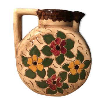 Ceramic pitcher with floral decoration signed Lucq