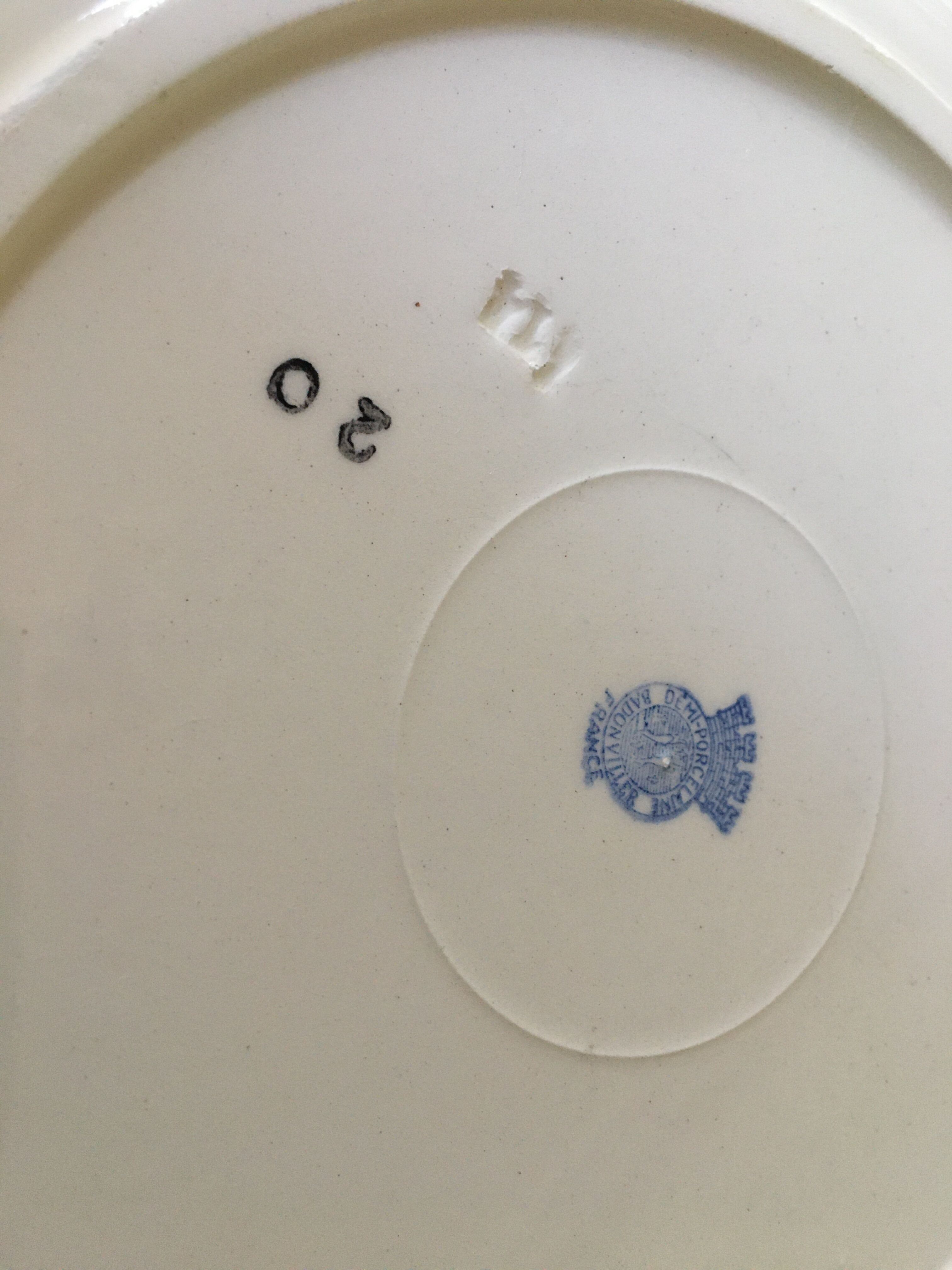 Round hollow earthenware dish