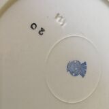 Round hollow earthenware dish
