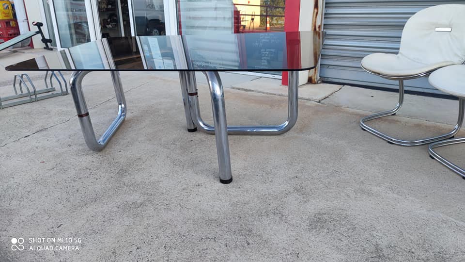 Table on top of glass and base in chromed metal around 1970 modular