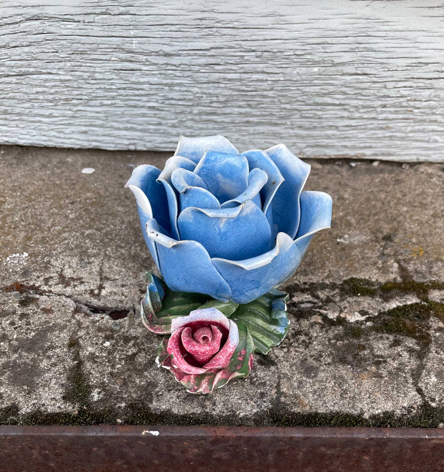 Old barbotine candle holder in the shape of a rose