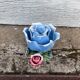 Old barbotine candle holder in the shape of a rose