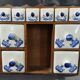 Vintage spice rack wood and earthenware blue decor