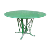 Table ronde de jardin ancienne en métal riveté